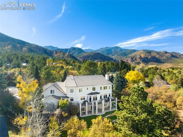 a view of a city with a building in the background