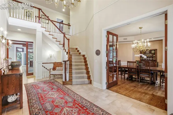 a view of a livingroom with furniture and a rug