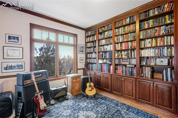 a room with furniture book shelf and a book shelf