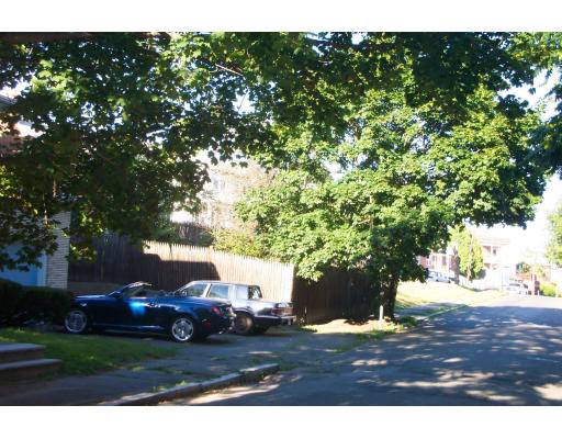 37 Ridge Road Revere, MA 02151 - Photo 3 of 18 a view of yard with car parked