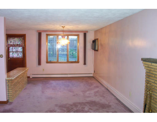 37 Ridge Road Revere, MA 02151 - Photo 6 of 18 a view of an empty room with a window