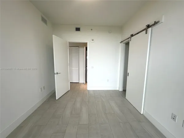 a bathroom with a sink a mirror and a bathtub
