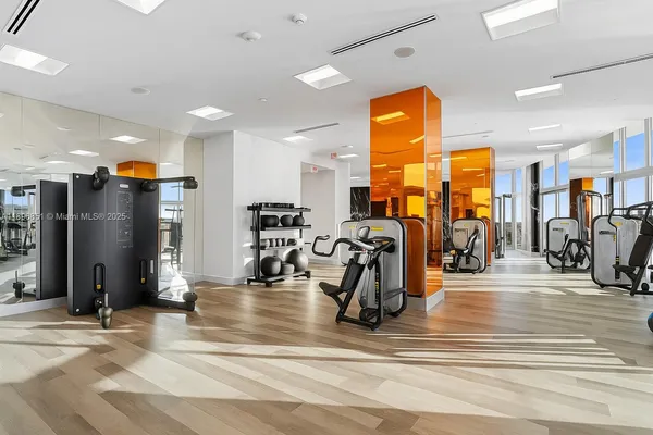a view of a room with gym equipment