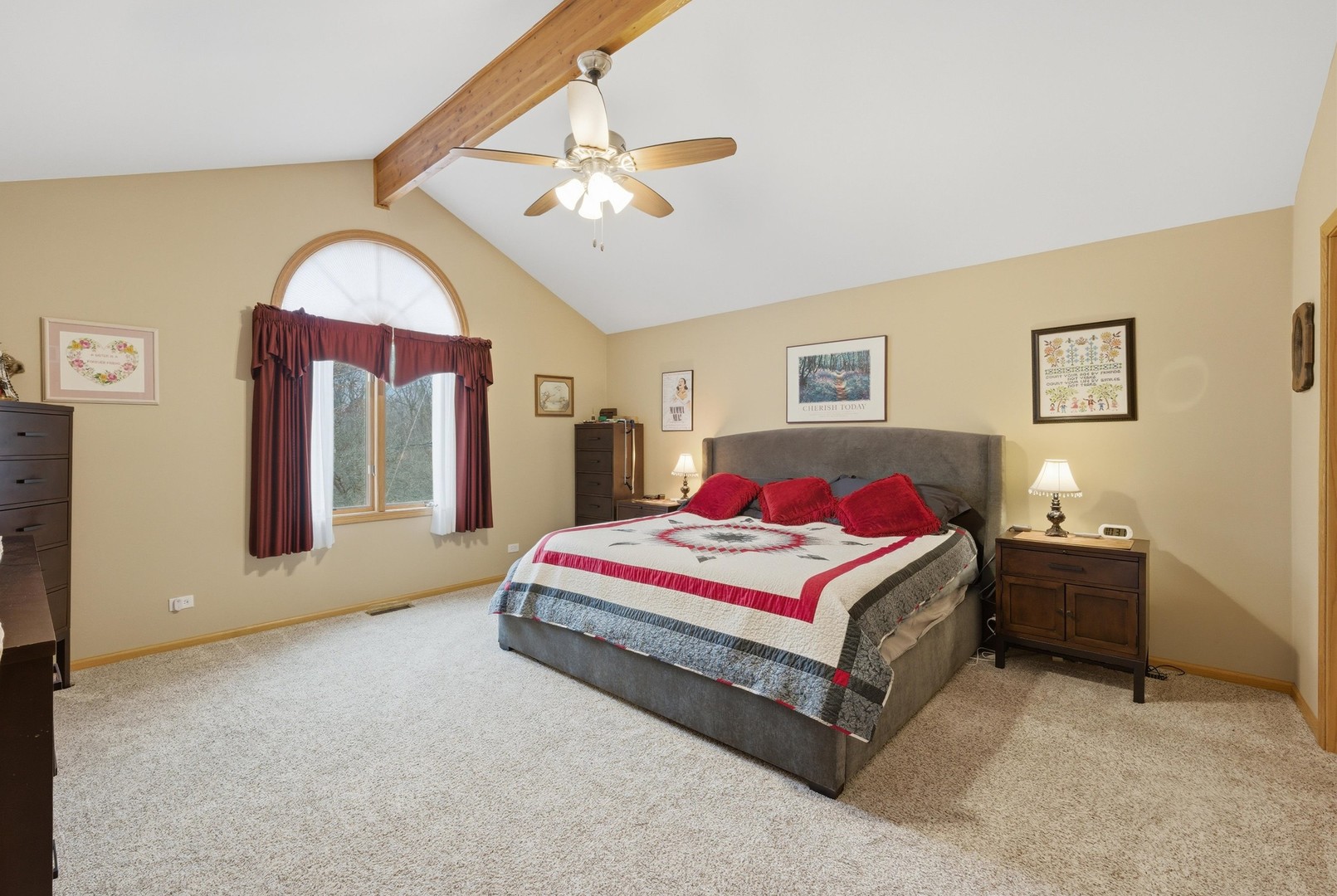 3688 Warwick Drive Crete, IL 60417 - Photo 13 of 27 a bedroom with a bed and a chandelier