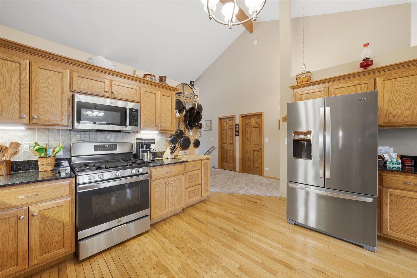 3688 Warwick Drive Crete, IL 60417 - Photo 10 of 27 a kitchen with stainless steel appliances granite countertop a refrigerator stove and sink