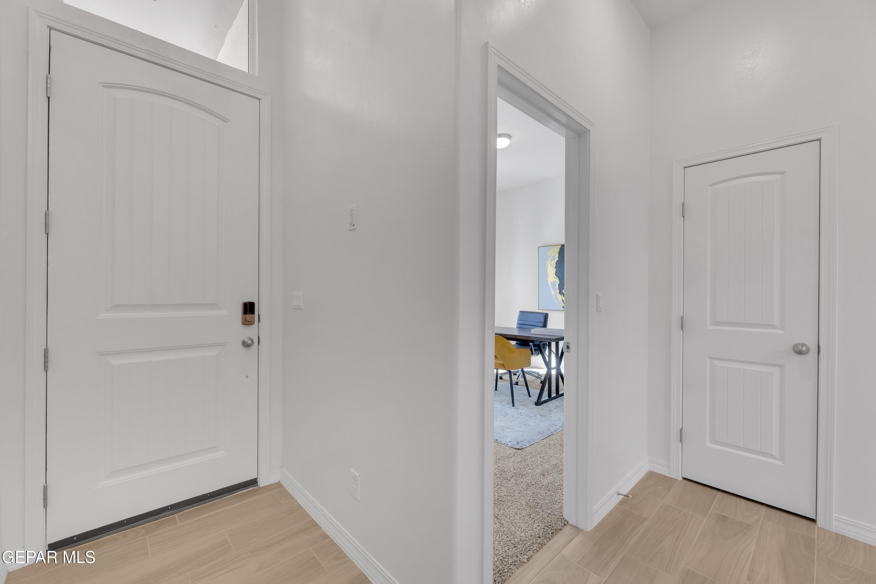 6040 Summer Ridge Sunland Park, NM 88008 - Photo 16 of 31 a view of an entryway with wooden floor