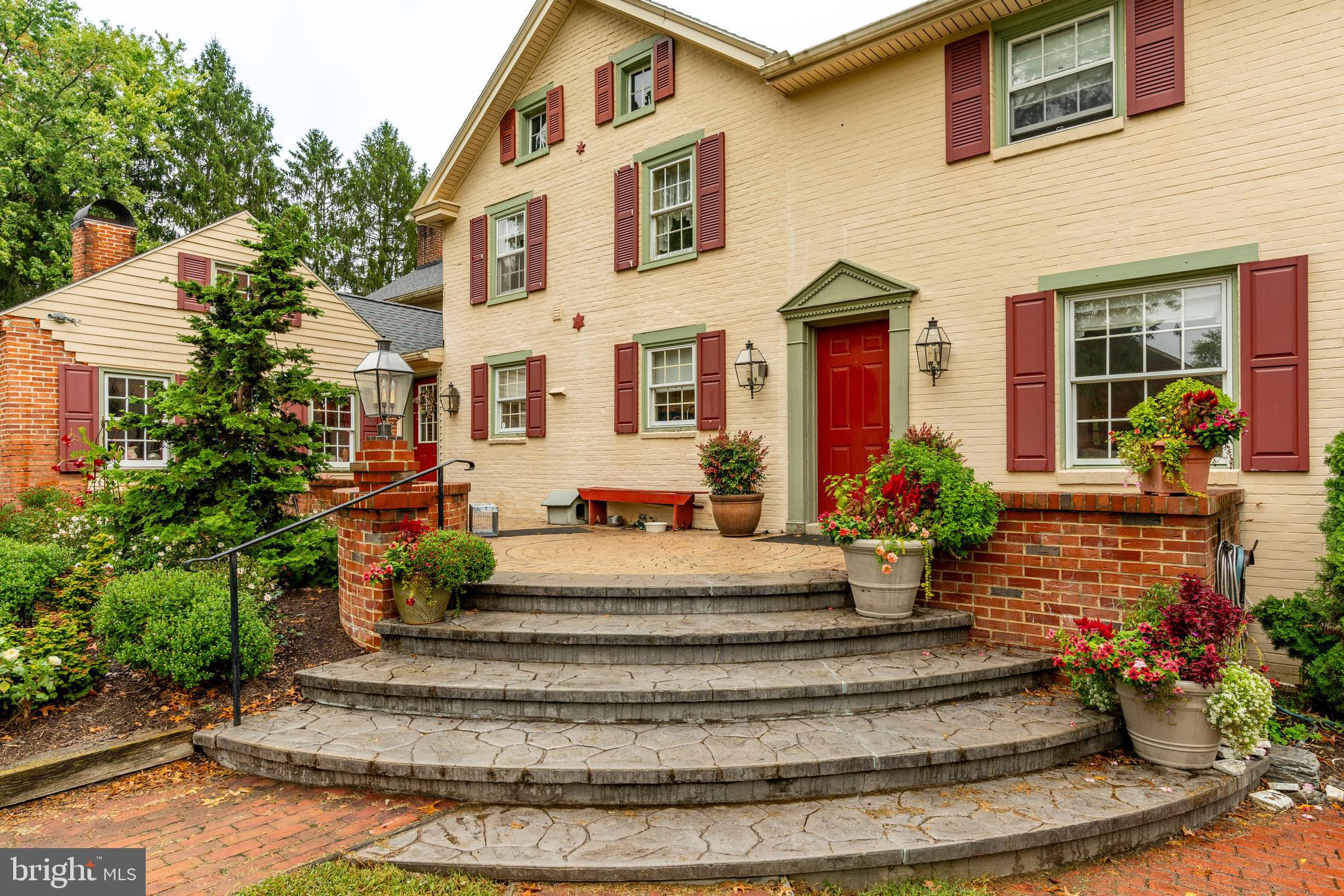 249 Landis Valley Road Lititz, PA 17543 - Photo 13 of 104 a front view of a house with a garden