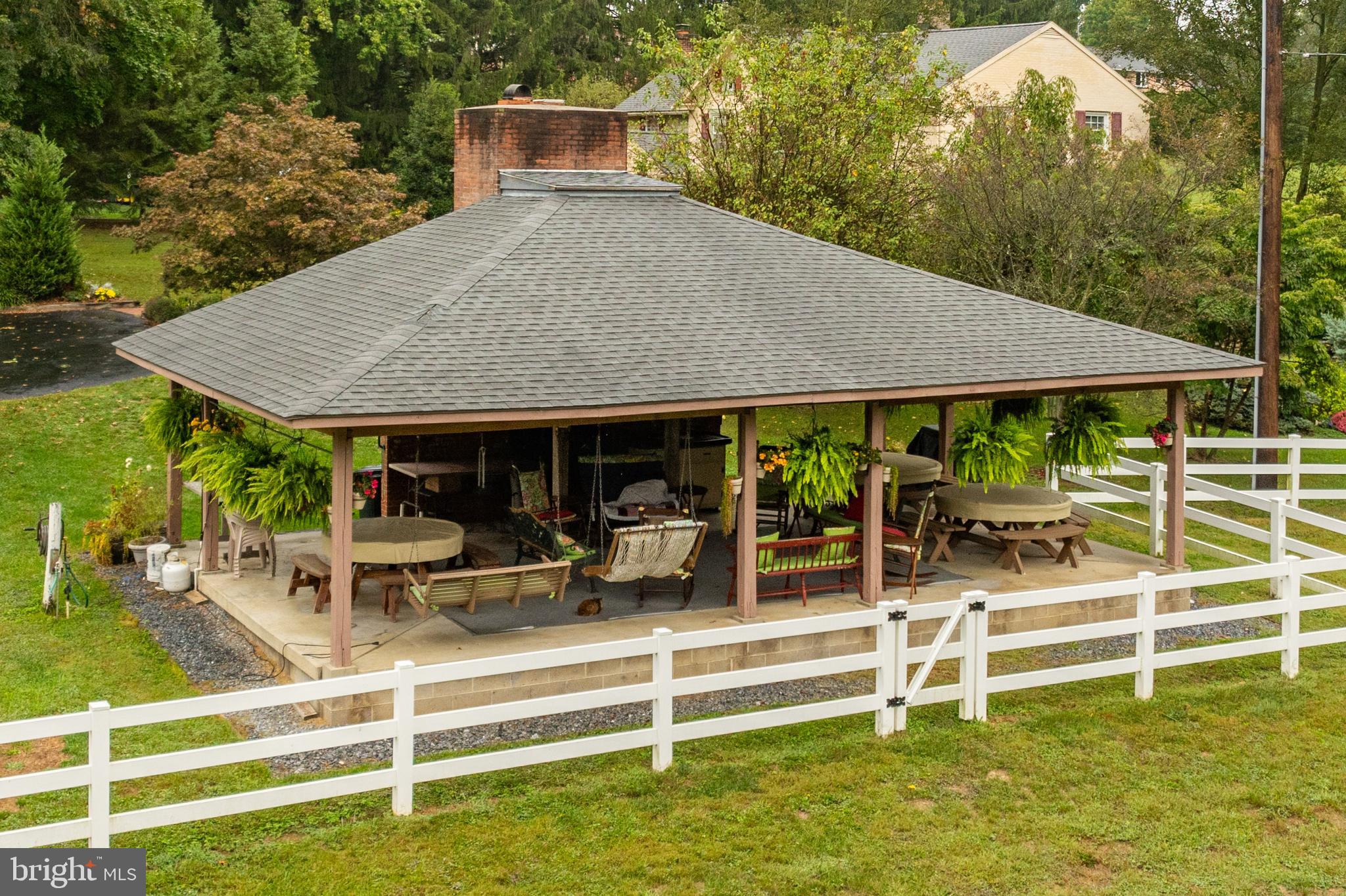 249 Landis Valley Road Lititz, PA 17543 - Photo 30 of 104 a view of a house with a backyard patio and swimming pool