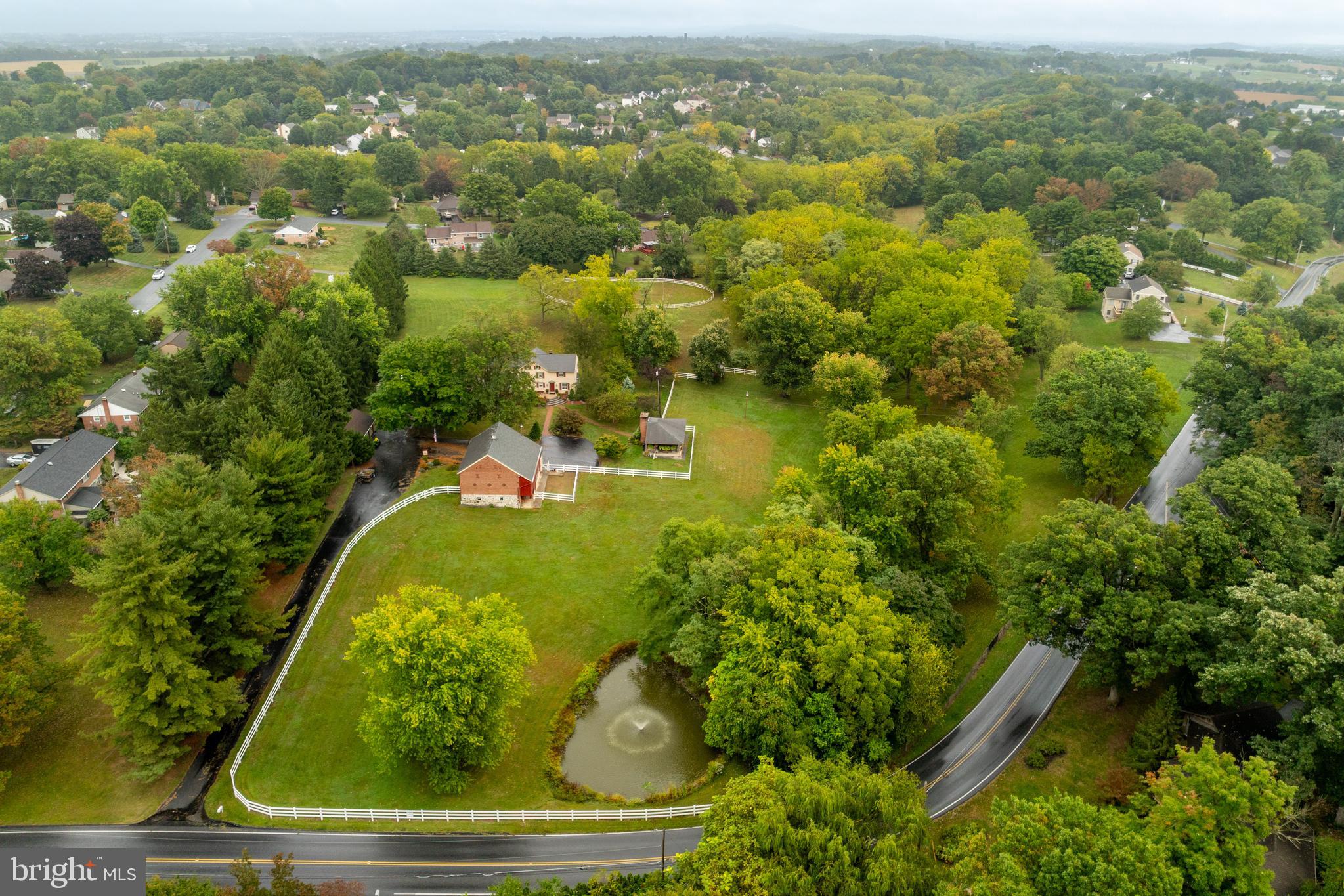 249 Landis Valley Road Lititz, PA 17543 - Photo 4 of 104 an aerial view of residential houses with outdoor space and trees