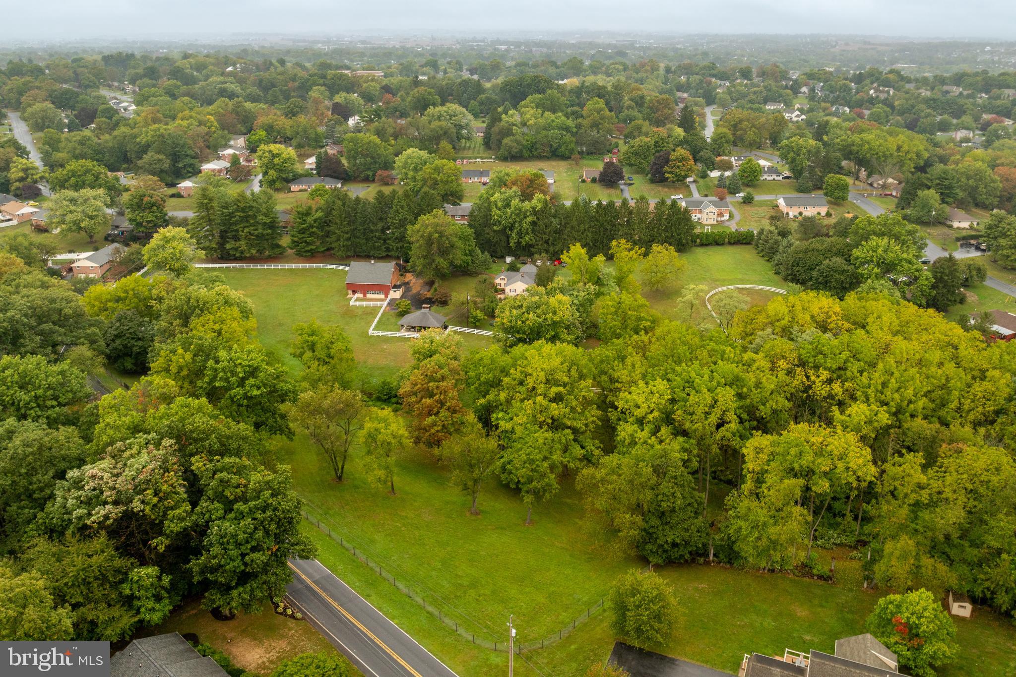 249 Landis Valley Road Lititz, PA 17543 - Photo 47 of 104 an aerial view of residential houses with outdoor space and trees