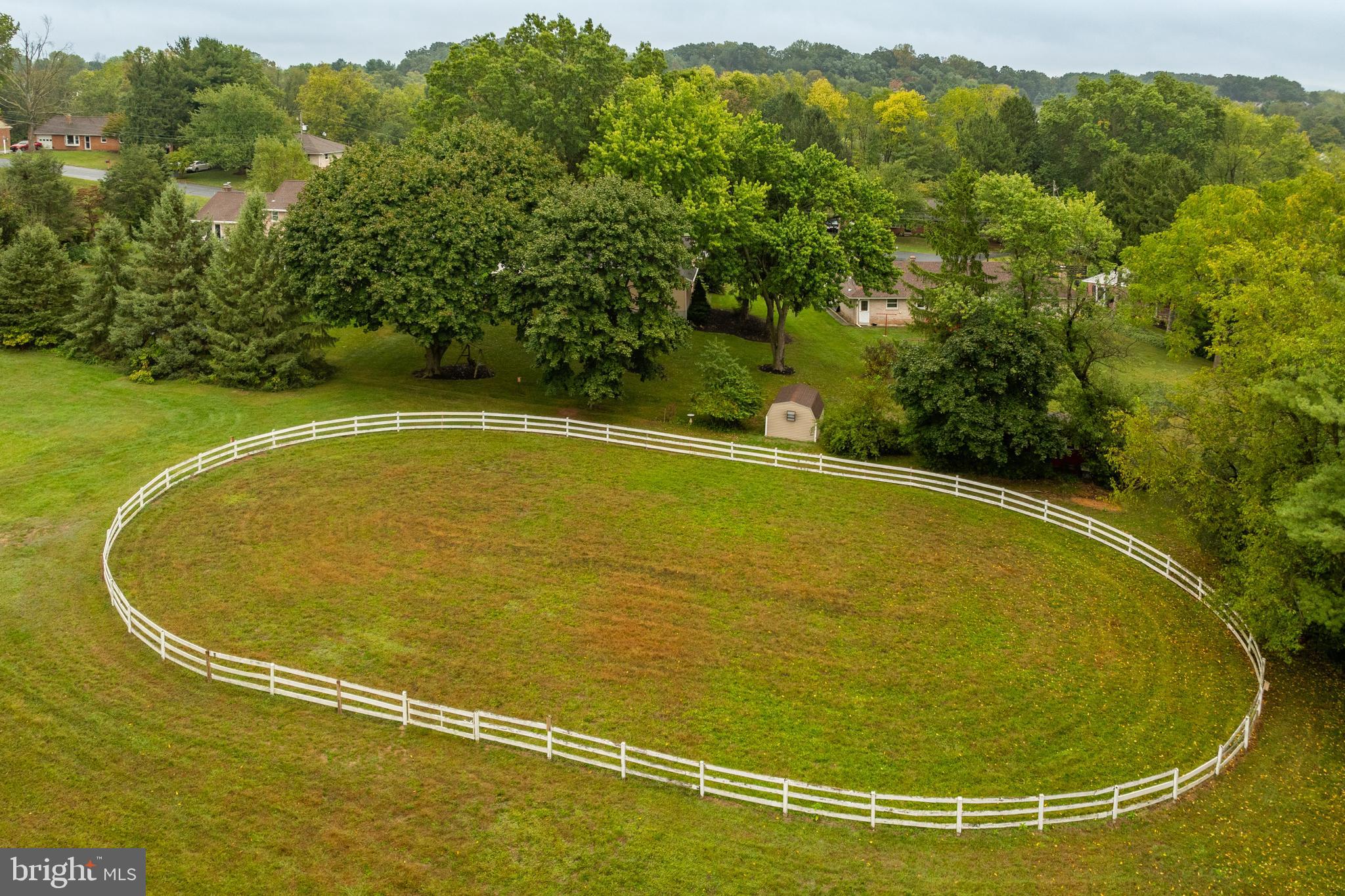 249 Landis Valley Road Lititz, PA 17543 - Photo 48 of 104 a view of a swimming pool and trees in the background