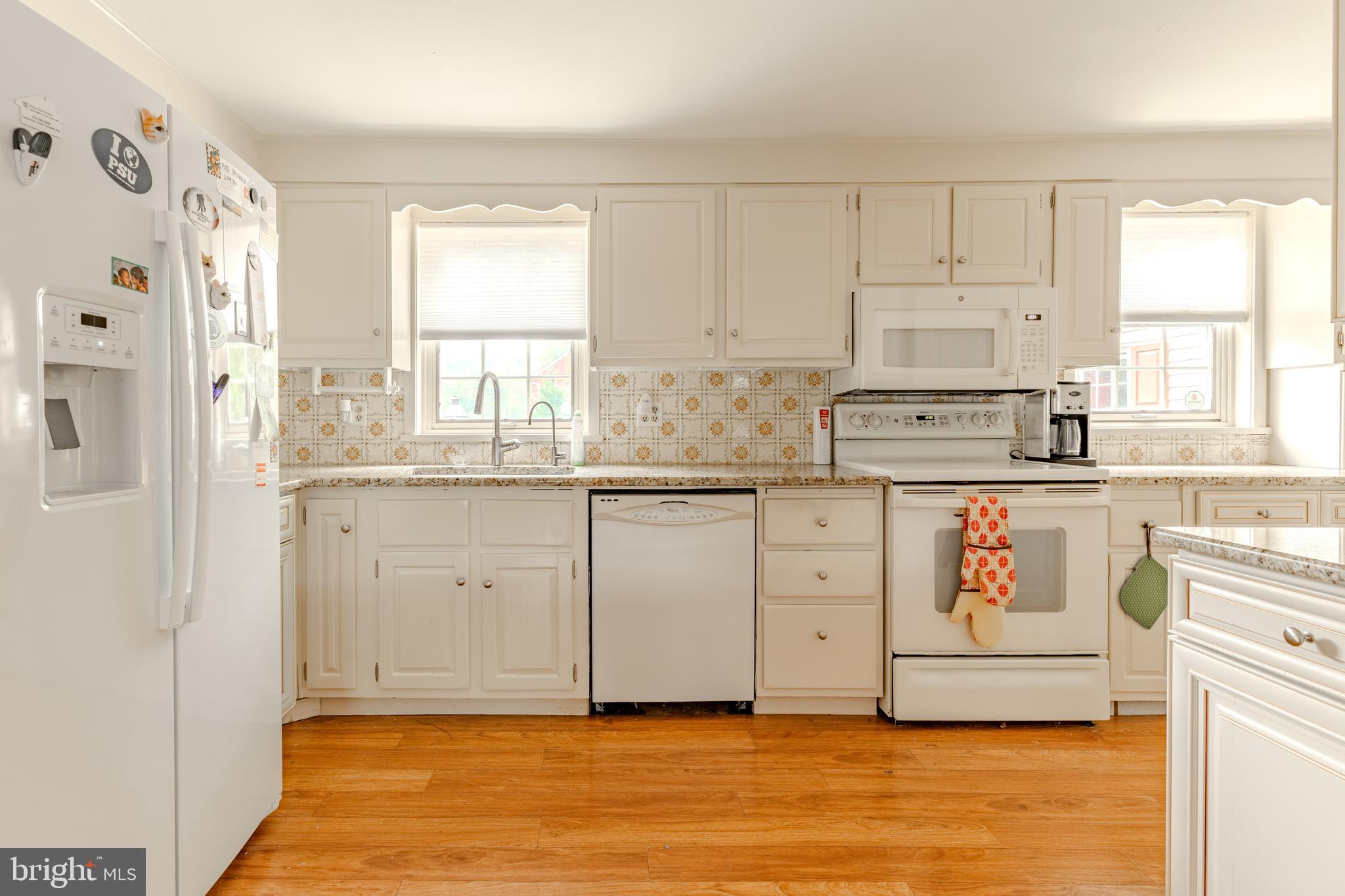 249 Landis Valley Road Lititz, PA 17543 - Photo 54 of 104 a kitchen with stainless steel appliances white cabinets and a window