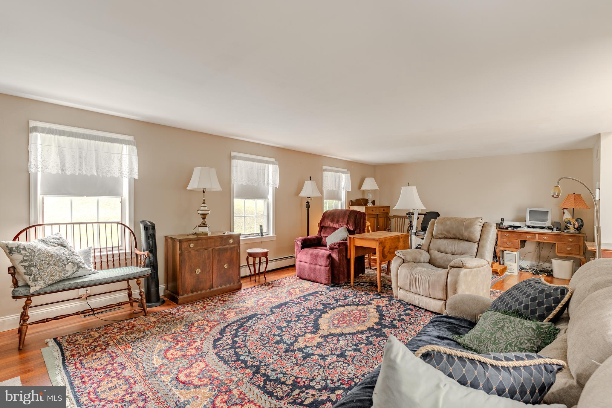 249 Landis Valley Road Lititz, PA 17543 - Photo 72 of 104 a living room with furniture and a window