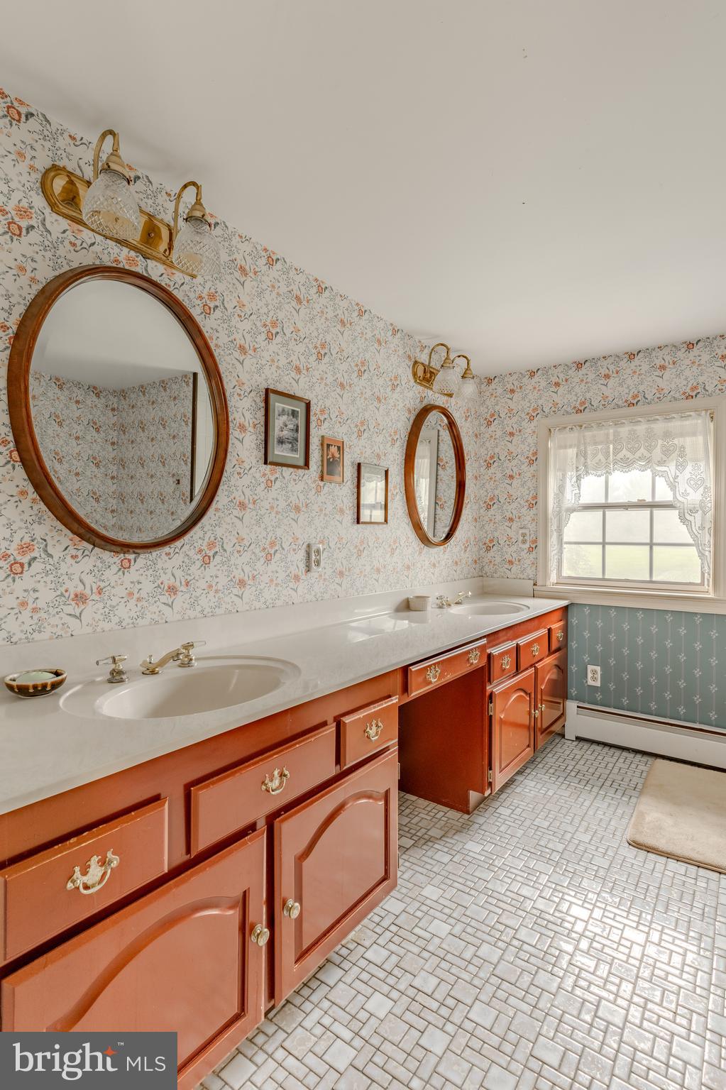 249 Landis Valley Road Lititz, PA 17543 - Photo 82 of 104 a bathroom with a granite countertop sink and a mirror