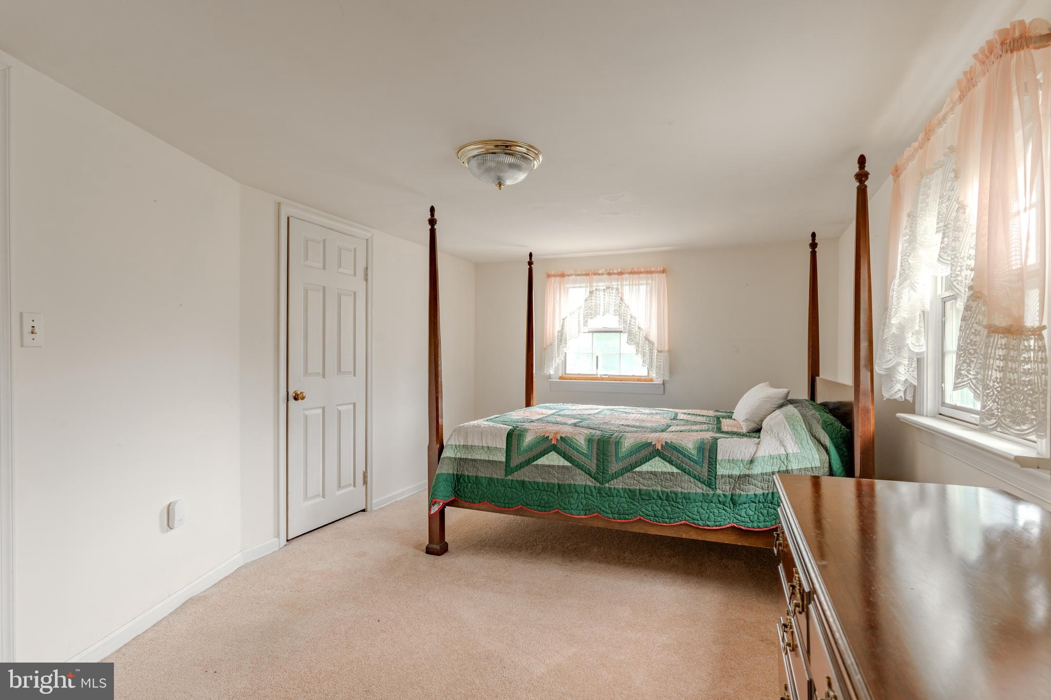 249 Landis Valley Road Lititz, PA 17543 - Photo 96 of 104 a bedroom with a bed and a window