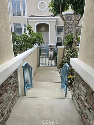 a view of a chair and table in the balcony