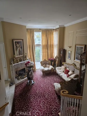 a bed room with furniture and a window