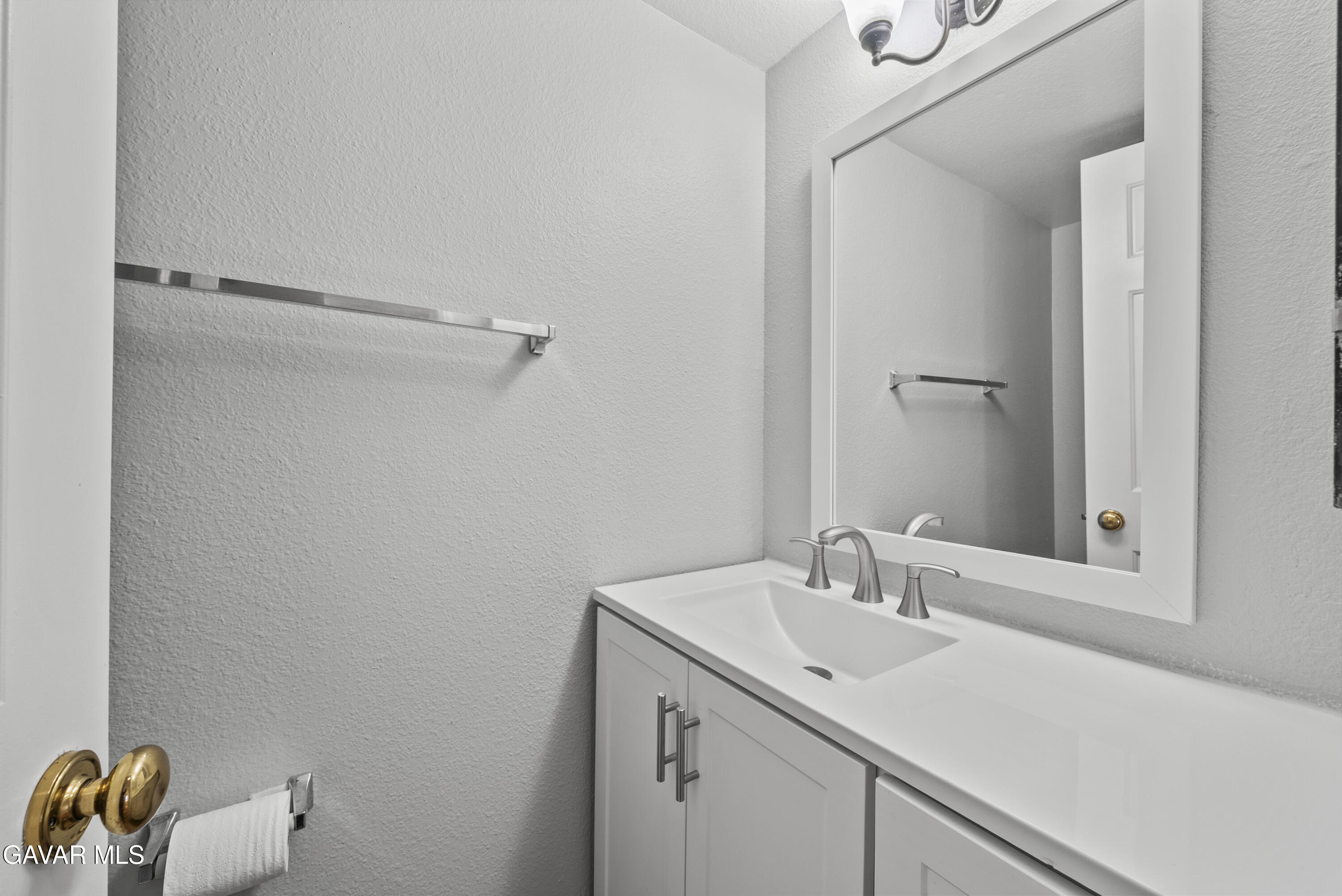 42805 15th Street West Lancaster, CA 93534 - Photo 13 of 27 a bathroom with a sink and a toilet
