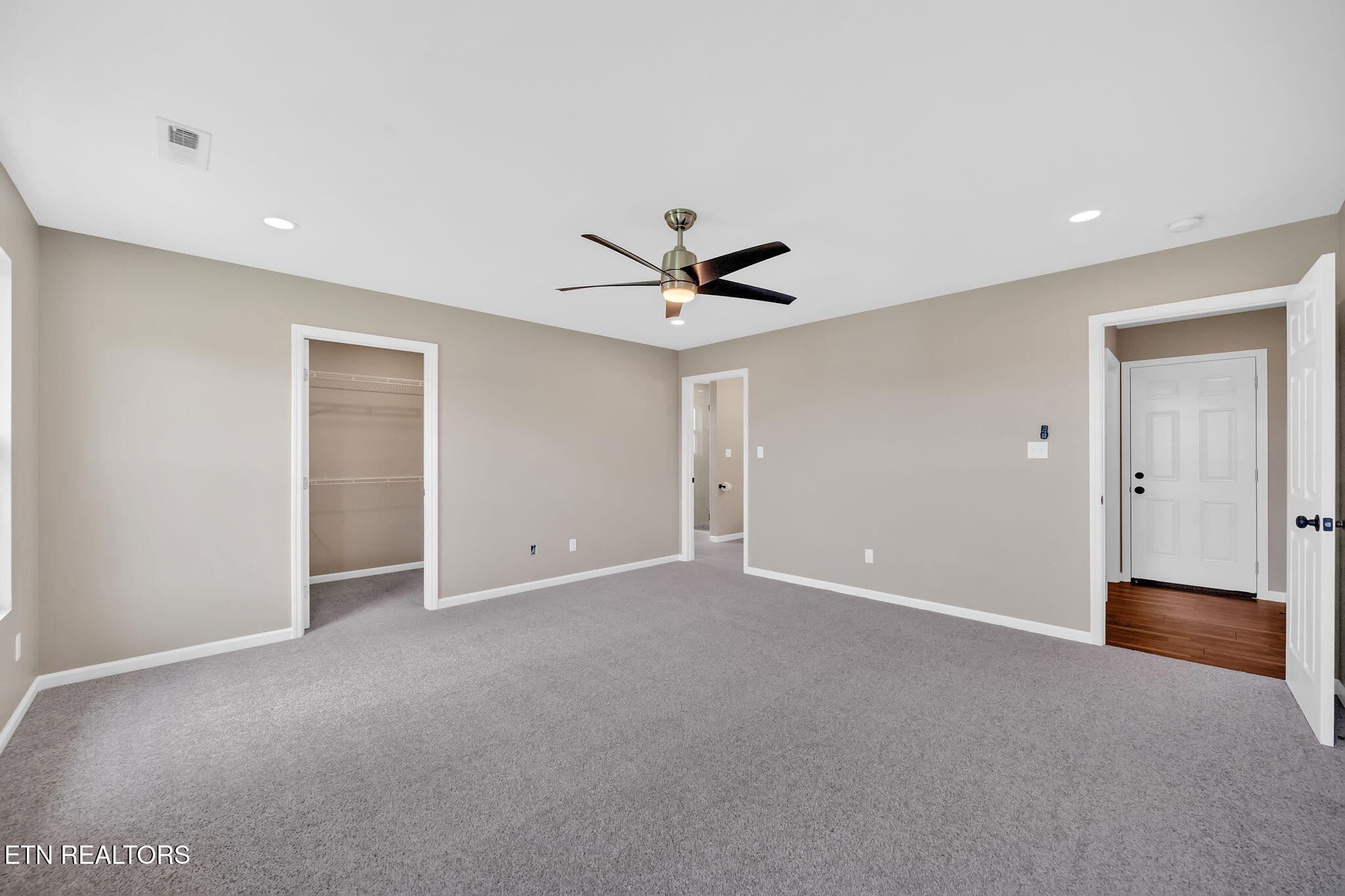 141 Middle Glen Road Maynardville, TN 37807 - Photo 18 of 41 a view of an empty room with a ceiling fan