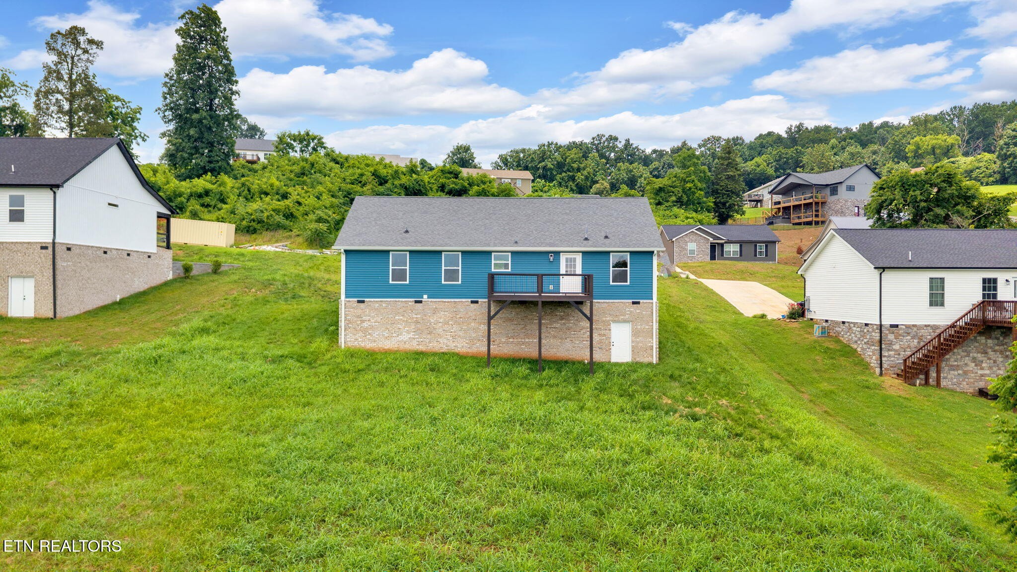 141 Middle Glen Road Maynardville, TN 37807 - Photo 35 of 41 aerial view of a house with a big yard and large trees