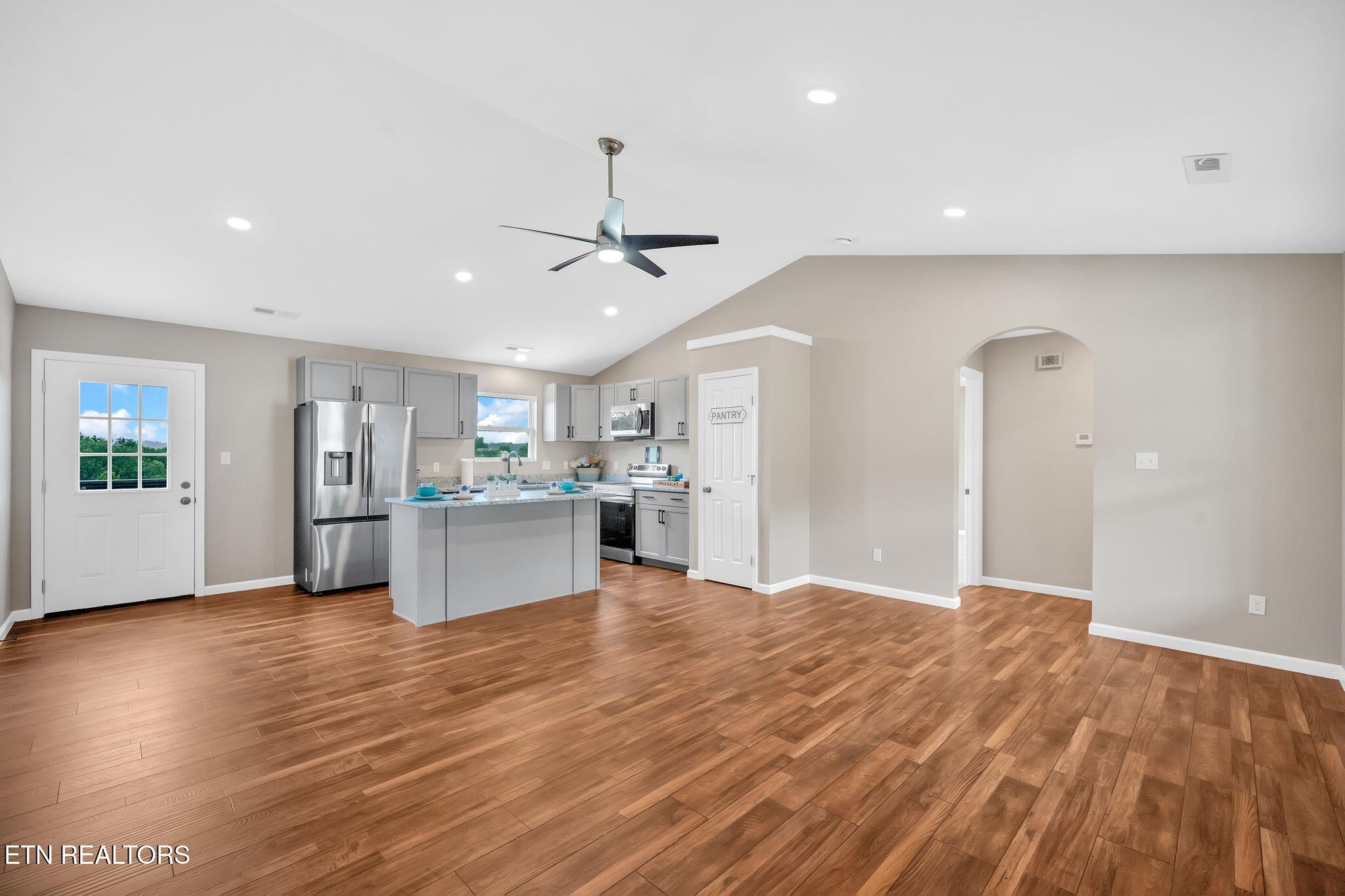 141 Middle Glen Road Maynardville, TN 37807 - Photo 5 of 41 a large kitchen with stainless steel appliances granite countertop a refrigerator and a sink