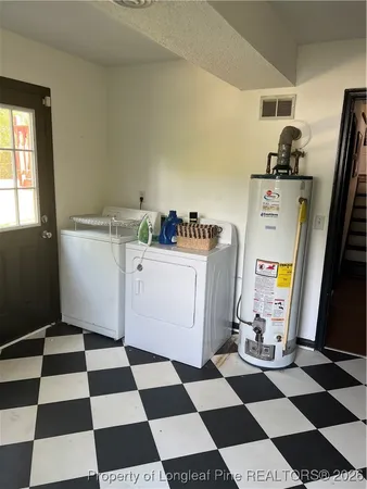 a white refrigerator freezer and a black appliances