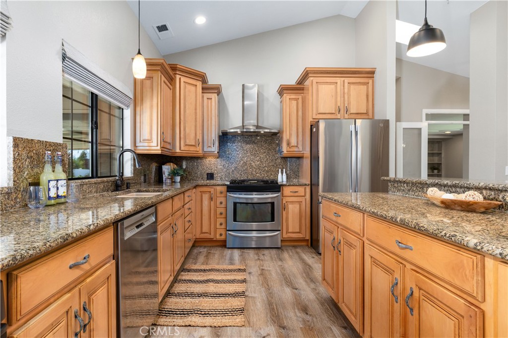 1275 Shane Lane Templeton, CA 93465 - Photo 13 of 70 a kitchen with granite countertop a refrigerator and a sink