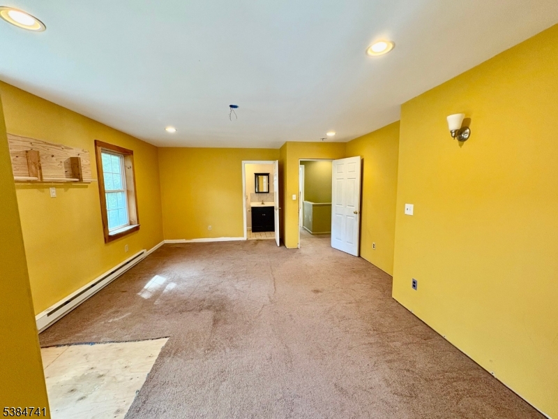 5327 Berkshire Valley Road, Unit 5 Oak Ridge, NJ 07438 - Photo 14 of 32 a view of empty room with painted walls