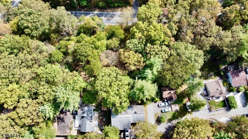 5327 Berkshire Valley Road, Unit 5 Oak Ridge, NJ 07438 - Photo 28 of 32 an aerial view of a houses with yard