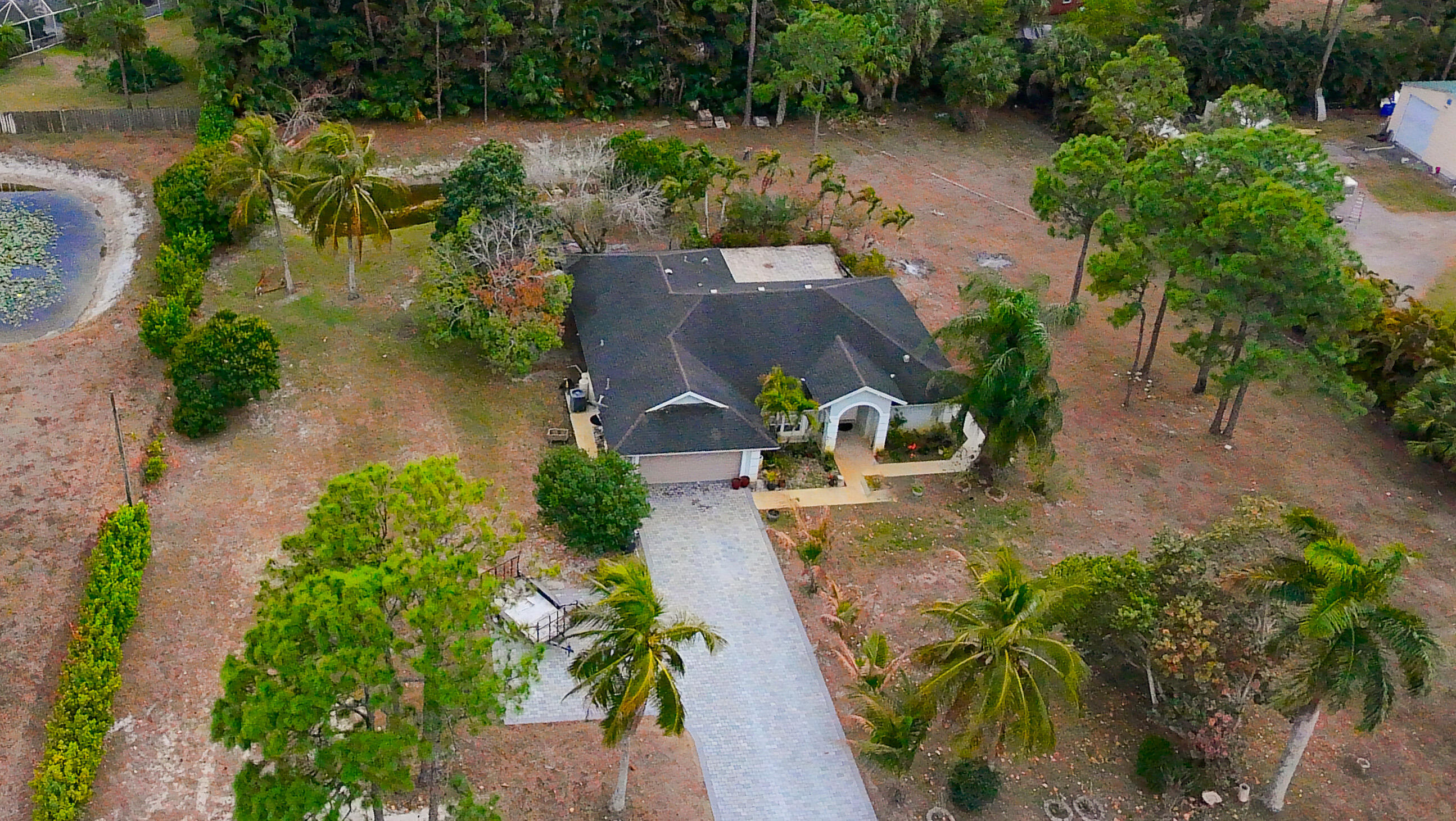 17566 71st Lane North Loxahatchee, FL 33470 - Photo 1 of 22 Front