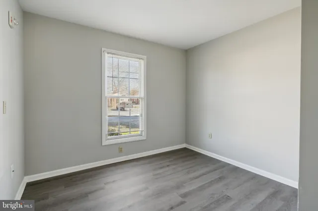 a view of a kitchen from the hallway