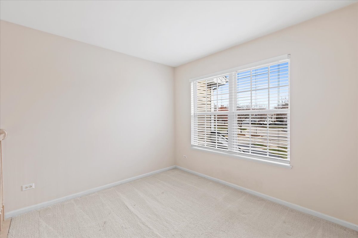 962 Willow Street Itasca, IL 60143 - Photo 17 of 33 a view of an empty room with a window