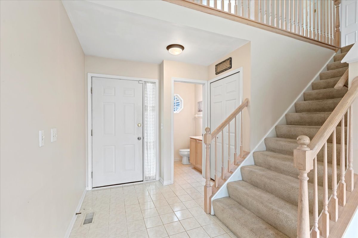 962 Willow Street Itasca, IL 60143 - Photo 30 of 33 a view of staircase with white walls and white walls