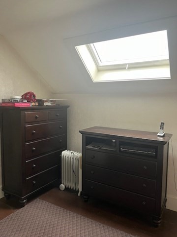 8 Grove Street Ayer, MA 01432 - Photo 12 of 20 a room with a dresser and a window