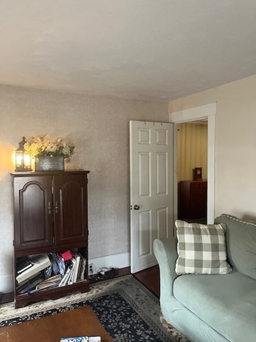 8 Grove Street Ayer, MA 01432 - Photo 9 of 20 a living room with furniture and a flat screen tv