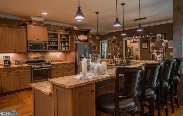 a kitchen with a sink stove and cabinets