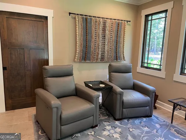 a bathroom with a sink mirror vanity and toilet