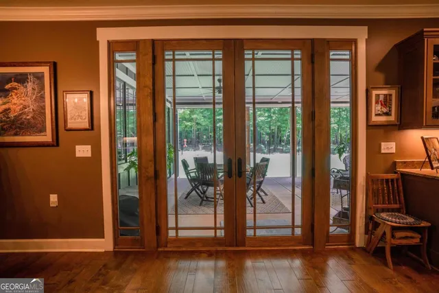 a patio with table and chairs