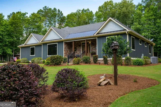 a view of backyard with green space