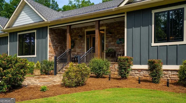 front view of a house with a yard