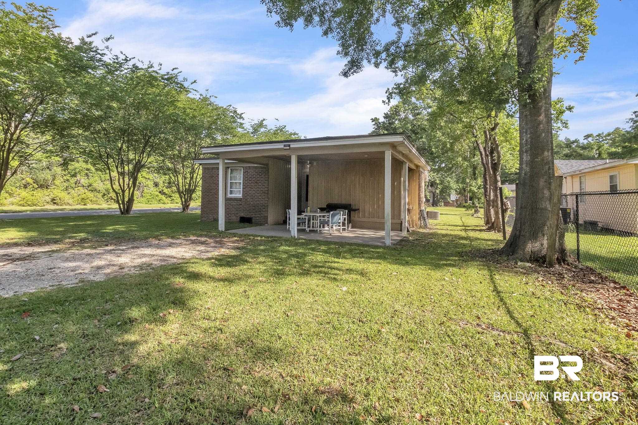315 Fourth Avenue Chickasaw, AL 36611 - Photo 8 of 28 Exterior space with fence