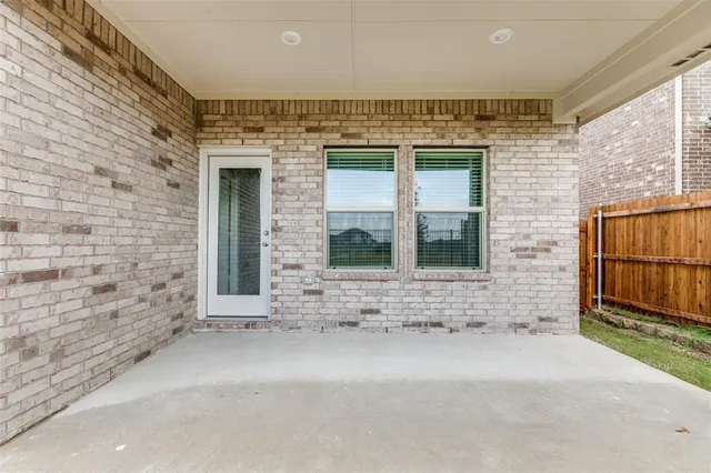 a view of entrance door of a building