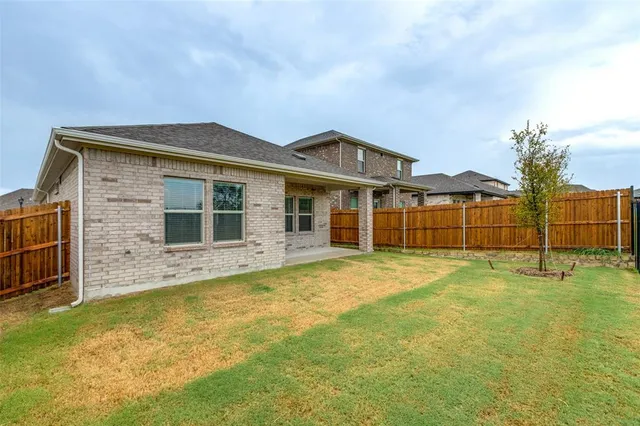 a view of a house with a swimming pool