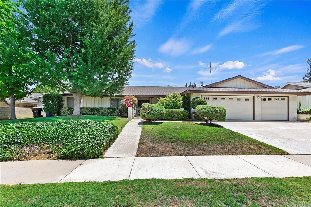 5314 Avondale Way Riverside, CA 92506 - Photo 1 of 1 a front view of a house with a garden