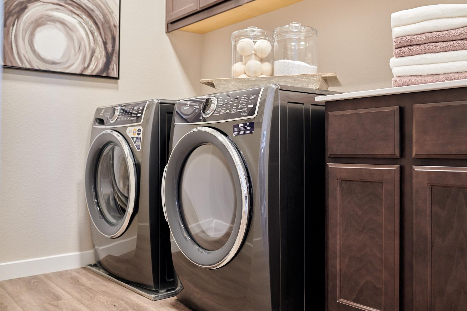 4719 Ariel Street Keyes, CA 95328 - Photo 14 of 22 a utility room with dryer and washer