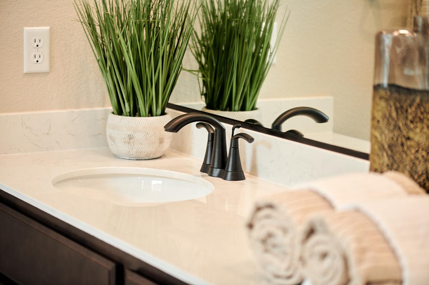 4719 Ariel Street Keyes, CA 95328 - Photo 18 of 22 a close view of a sink and a faucet in the kitchen next to a yard