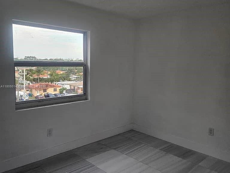Flagami Miami, FL 33144 - Photo 11 of 14 an empty room with a window