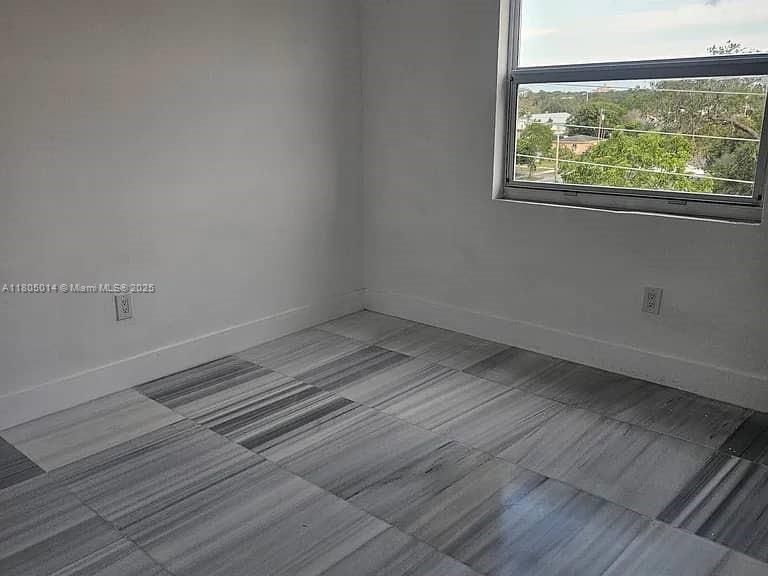 Flagami Miami, FL 33144 - Photo 6 of 14 a view of a room with wooden floor and windows