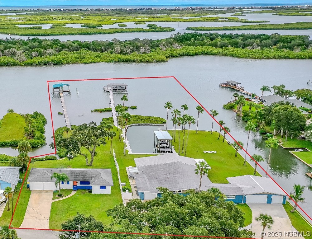 Undisclosed Address Edgewater, FL 32141 - Photo 1 of 34 a view of a city and an ocean