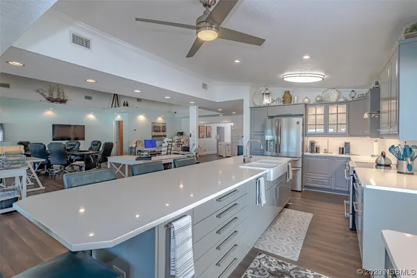 a large room with lots of furniture and view